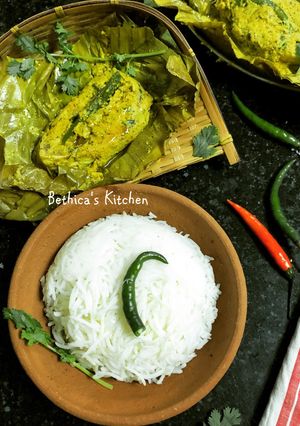 A picture of Ilish Paturi (Fish Steam Cooked in Banana Leaf).
