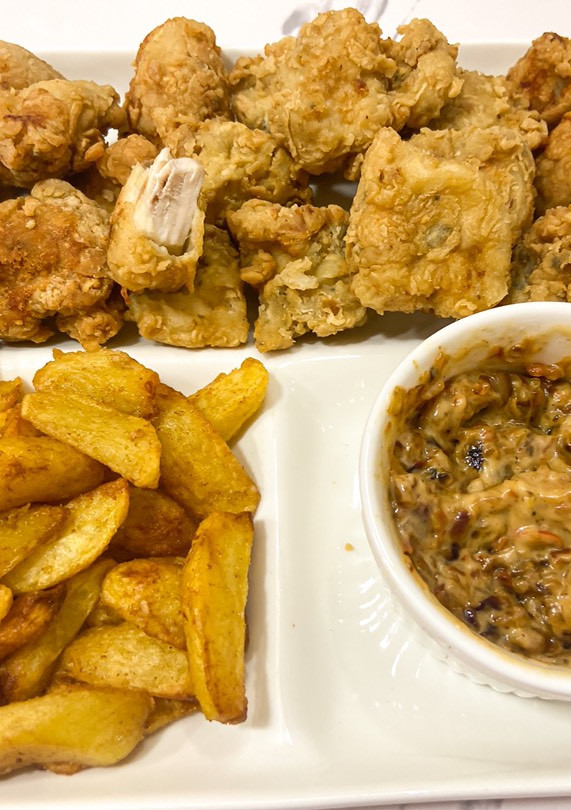 A picture of Chicken Nugget and Fries.