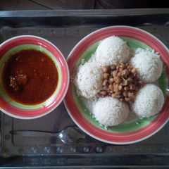 A picture of Rice,beans and stew.