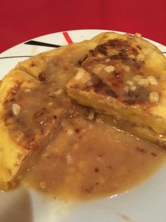 Una foto de Tortilla de patatas con cebolla en salsa