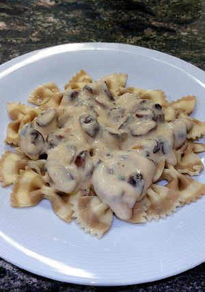 Una foto de Farfalle de boletus con salsa de parmesano y champiñones