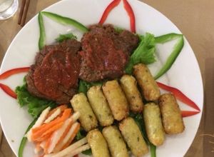 Hình của món Bò nướng nem xôi.