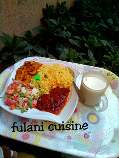A picture of Tumeric rice with vegetables.