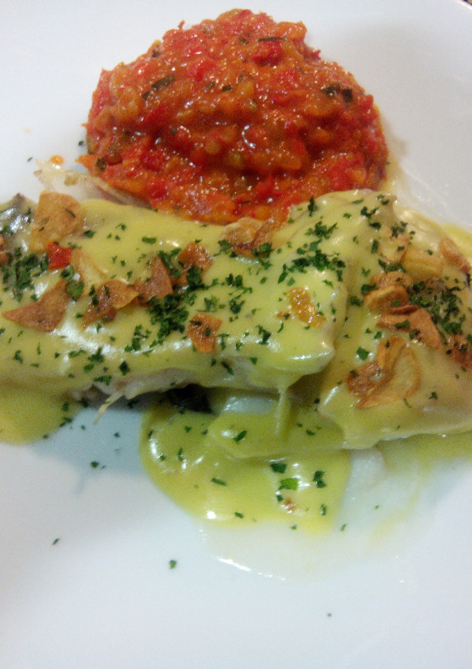 Una foto de Bacalao al pil-pil con pisto