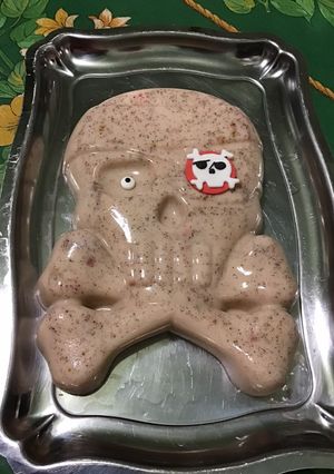 Une photo de Flan halloweenesque à la vanille, noisettes et grenade