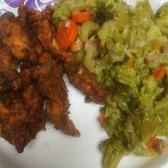 A picture of Eleven Herbs and Spices Chicken, Vegetables, and Ham Hash.