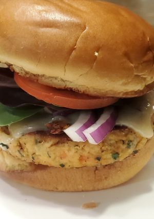 A picture of Brad's spinach and feta salmon burgers with peri-peri sauce.