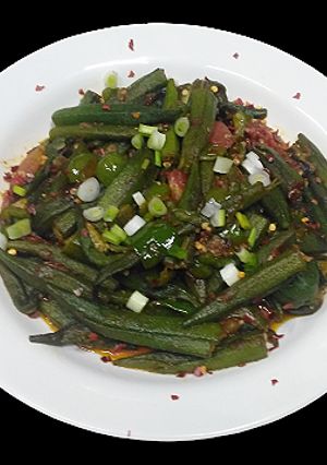 A picture of Spicy schezwan bhindi.