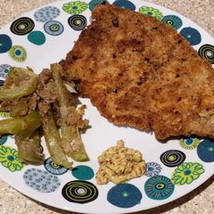 A picture of Griddle Wienerschnitzel with fixins.