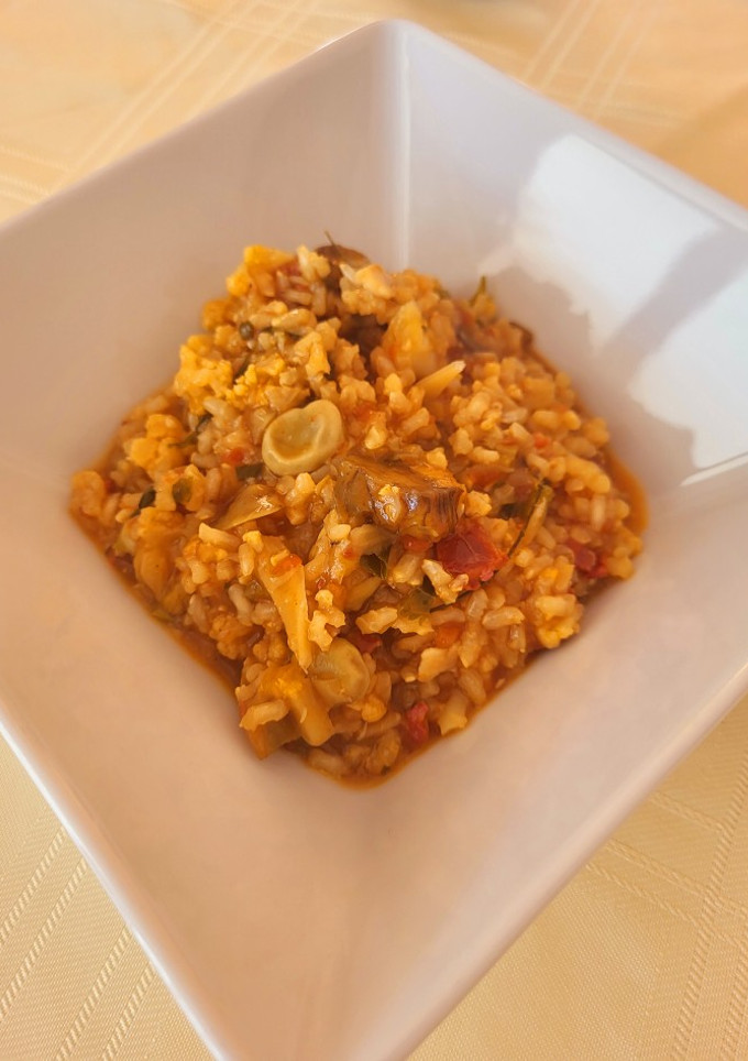 Una foto de Arroz caldoso, hogar dulce hogar