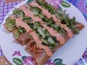 Una foto de tacos de surimi