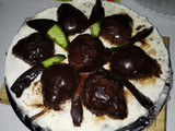 Cheesecake de peras al borgoña y cascaritas de pomelo