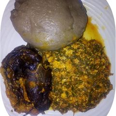 A picture of Amala( yamflour with bitterleaf soup.