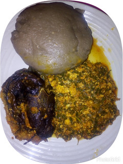 A picture of Amala( yamflour with bitterleaf soup.