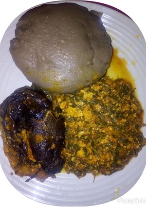 A picture of Amala( yamflour with bitterleaf soup.