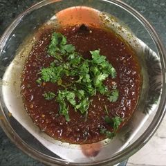 A picture of Tomato or jaggery ki khatti and mitthi chutney.