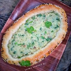 A picture of Stuffed turkish pide bread.