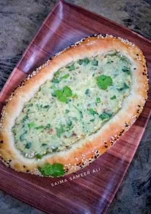 A picture of Stuffed turkish pide bread.