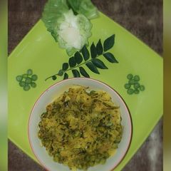 A picture of Cabbage green peas dry curry.