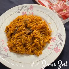 A picture of Orzo with Button Mushrooms in Red Sauce.