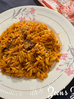 A picture of Orzo with Button Mushrooms in Red Sauce.