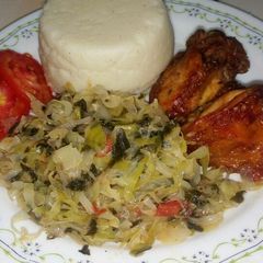 A picture of Oven grilled chicken with fried cabbage and Sima.