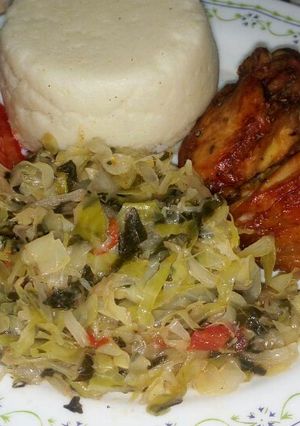 A picture of Oven grilled chicken with fried cabbage and Sima.