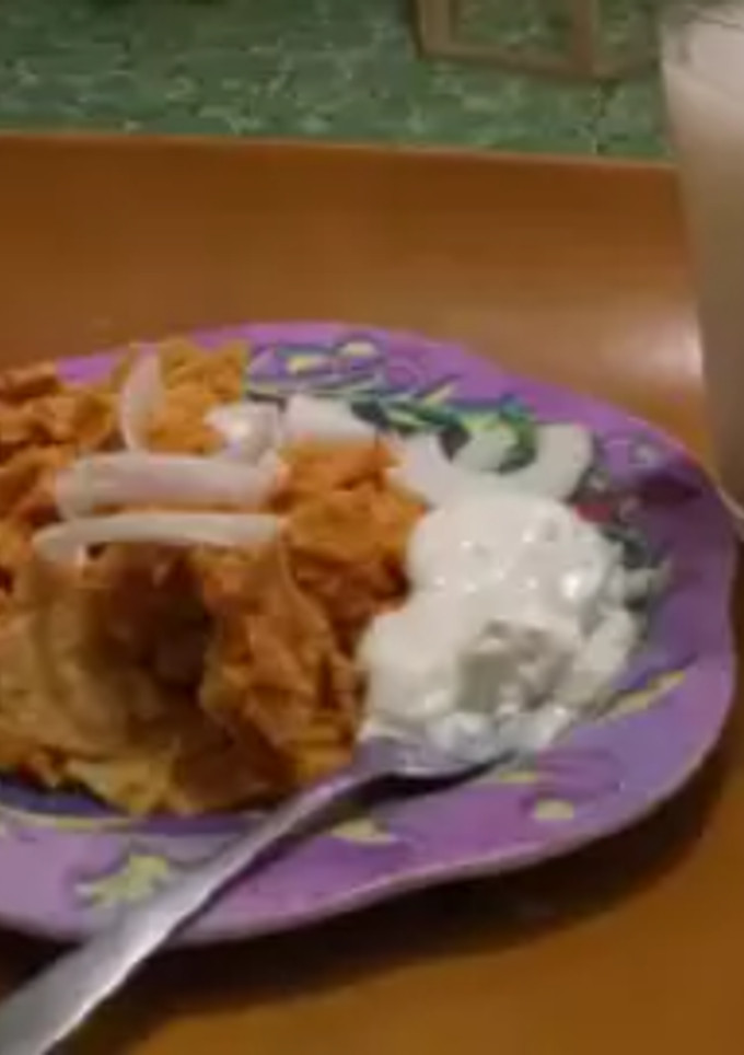 Una foto de Chilaquiles rojos