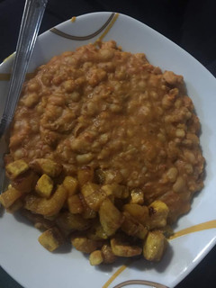 A picture of Porridge Beans and Fried Plantain.