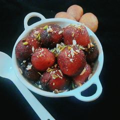 A picture of Potato Gulab jamun.