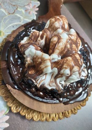 A picture of Sizzling brownie with ice cream.