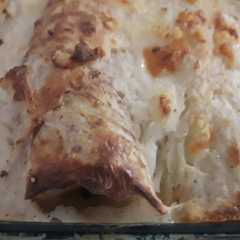 Una foto de Canelones de acelga y ricota
