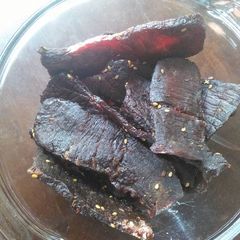 A picture of Momma's Teriyaki Beef Jerky (in a dehydrator).