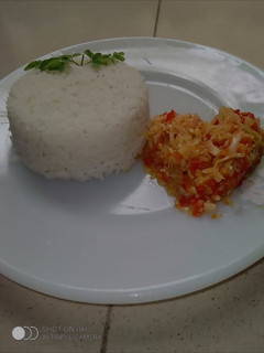 A picture of Cabbage and carrot sauce.