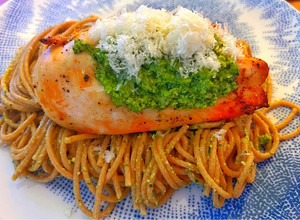 A picture of Grilled chicken breast with wholemeal spaghetti and basil & macadamia pesto.