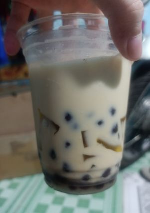 Hình của món Trà sữa thái trân châu socola topping thạch đào.