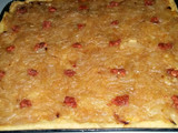Coca con cebolla caramelizada y sobrasada