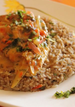 Una foto de Tacu tacu con  pescado a la chorrillana