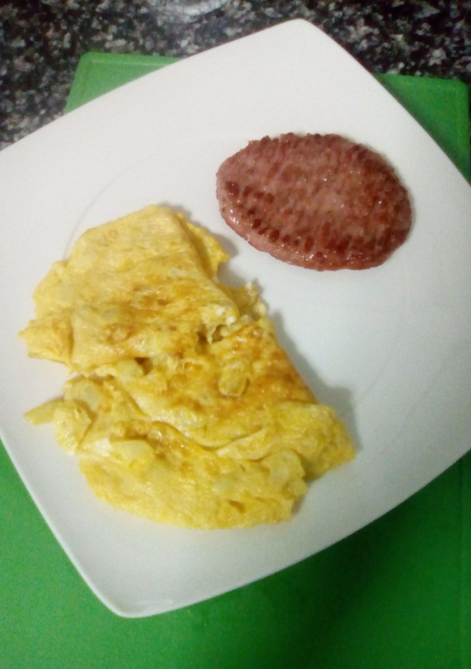 Una foto de Hamburguesa con tortilla de calabacín