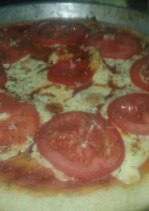 Una foto de Pizza de arvejas napolitana
