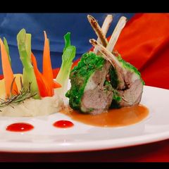A picture of Herb Roasted Lamb Rack with Juslie, Ruby Reduction & Mash Potato.
