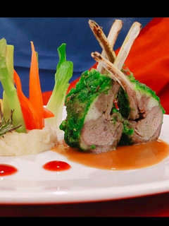 A picture of Herb Roasted Lamb Rack with Juslie, Ruby Reduction & Mash Potato.
