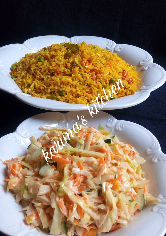 A picture of Fried rice with simple coleslaw.