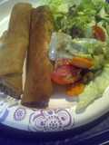 Spring roll hotdogs with salad