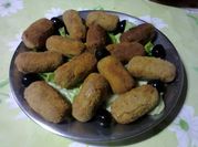 Uma foto de alheira croquetes