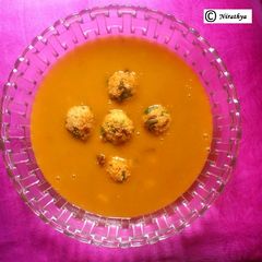 A picture of Tofu & Spinach Balls in Veggie Soup.