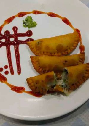 A picture of Cheesy Empanada.