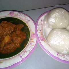 A picture of Pounded yam with ewedu and stew.