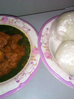 A picture of Pounded yam with ewedu and stew.