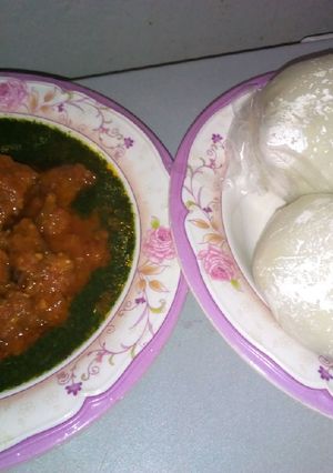 A picture of Pounded yam with ewedu and stew.